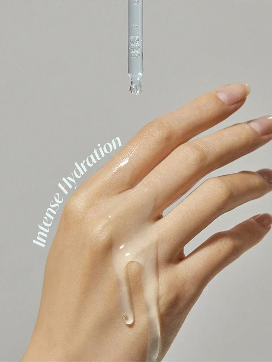 Torriden Dive-In Hyaluronic Acid Serum dripping onto hand for intense hydration